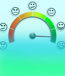 happy to unhappy faces around a circular green to red dial